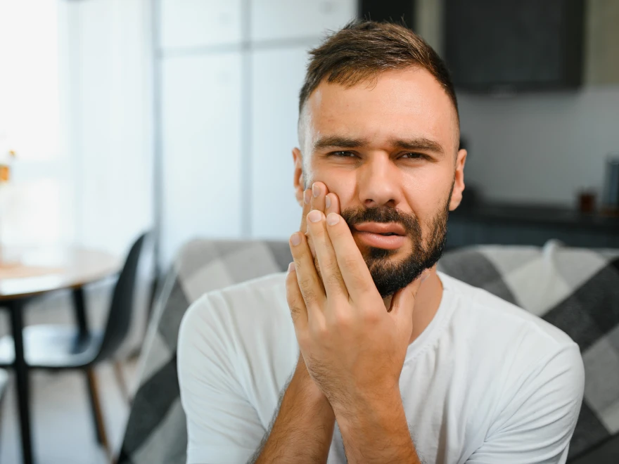 A person experiencing a toothache